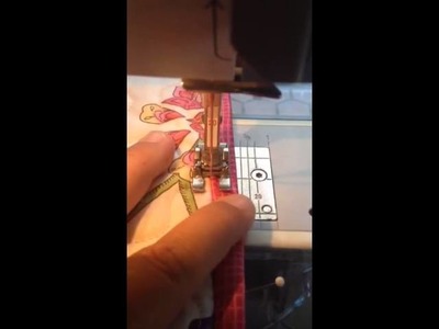 Sewing binding with a herringbone stitch