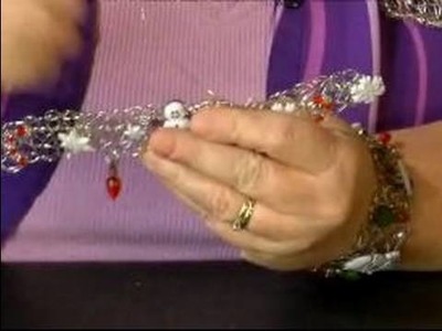How to Make Christmas Bracelets : Adding Decorations to Christmas Bracelets: Part 6