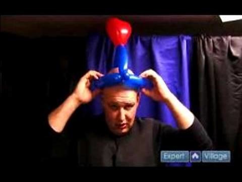 How to Make Balloon Hats : Adding Round Hearts to a Balloon Hat