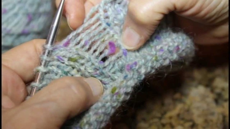 Fixing a mistake by dropping a stitch in Stockinet and Garter.