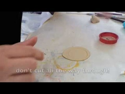 How to use rubber stamps and clay to make a pendant