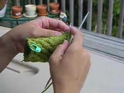 Me knitting a Fetching glove!