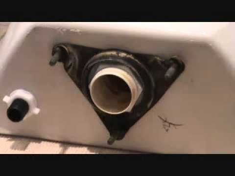 The toilet from hell. removing a leaking toilet tank gasket