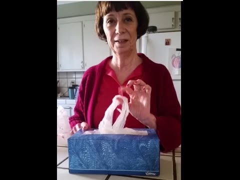 Lady Stores Plastic Grocery Bags so they Pop Up in Tissue Box