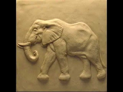 Sculpting a bas relief Elephant Tile