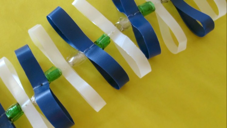 Make a Cool Vertical Plastic Bottle Garland - DIY Home - Guidecentral