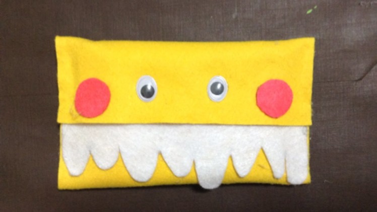 Make a Cute Felt Yellow Monster Pocket Tissue Holder - DIY Home - Guidecentral