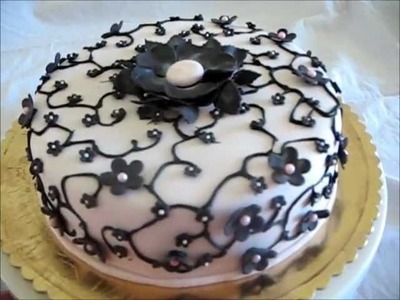 Decorating a Cake - Pink with black blossoms
