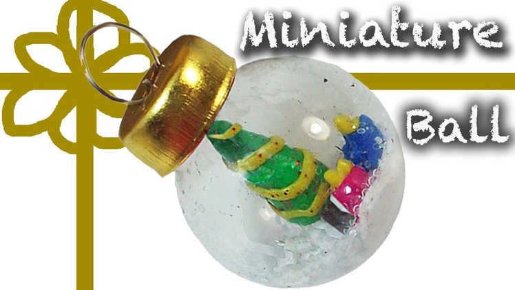 Polymer clay Miniature tree in a christmas ball - Arbolito de navidad