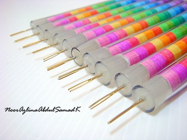 Rainbow colored handmade slotted quilling tools