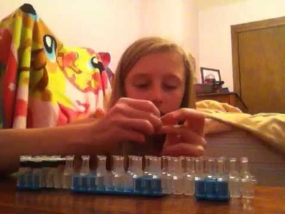 Rainbow loom tutorial on how to make an Oreo cookie charm!