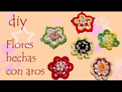 Flores hechas con aros de plastico Flowers made with plastic rings