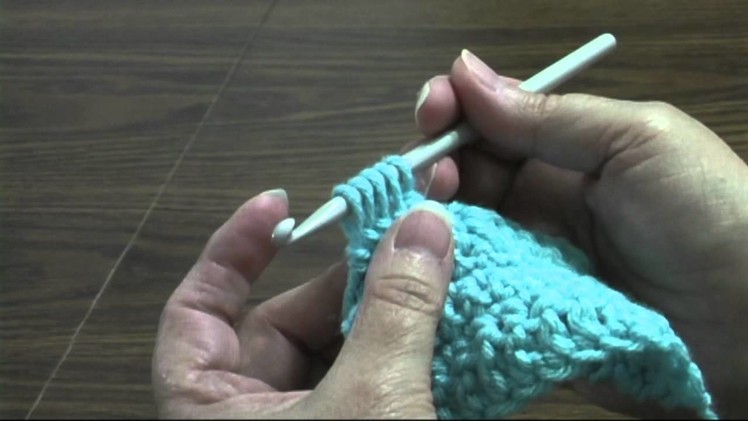 How to pull yarn through many loops on hook