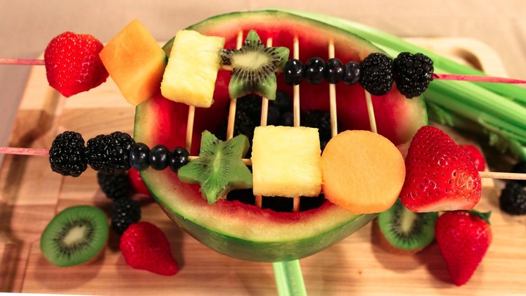 Rainbow Fruit Kebobs with a Watermelon Grill from Cookies Cupcakes and Cardio