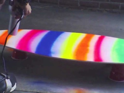 Soap painting a skimboard