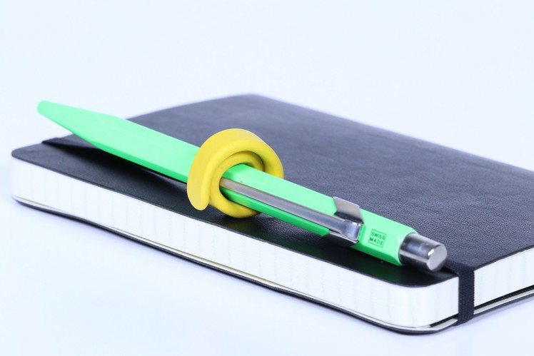 Keep your pen and notebook together with Sugru