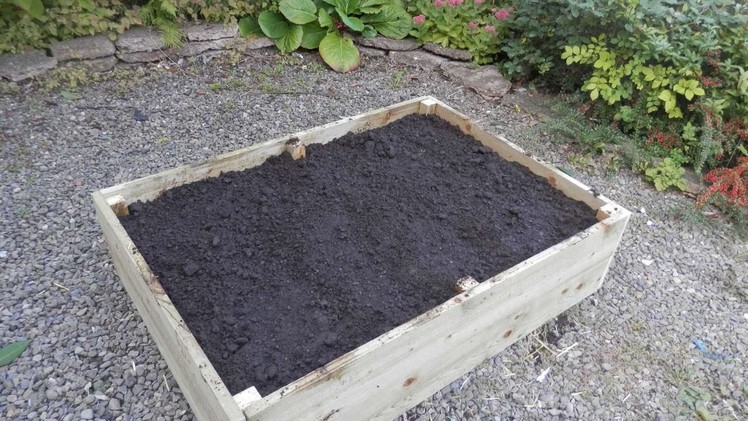How To Fill A Raised Bed Using The Lasagna Method - DIY Home Tutorial - Guidecentral