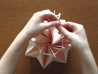 Origami Light Made by You - snapping and binding the top of the lamp
