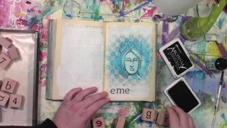 An altered book tutorial with a rubber stamp and a stencil