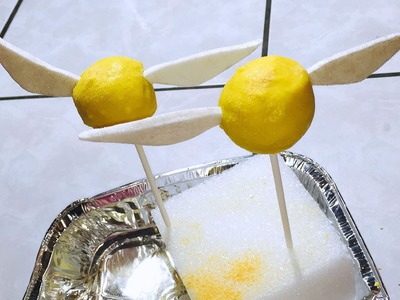 DIY Golden Snitch cake pops