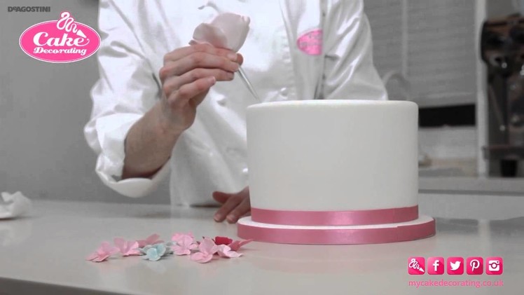 How to Stick Flowers.Ribbon onto a Cake - Cake Decorating Tutorial