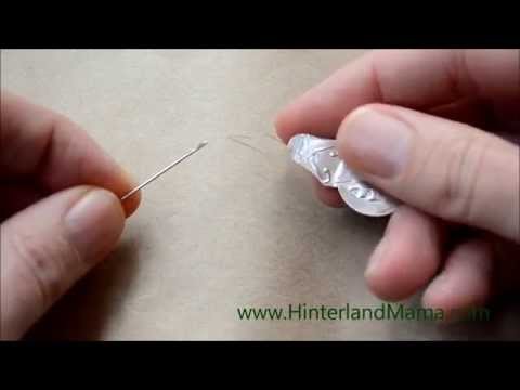 How to thread a needle using a reinforced Needle Threader - Video Tutorial