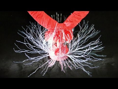 DIY Glimmering Centerpiece for Valentine's Day Using Paper and Water Bottle