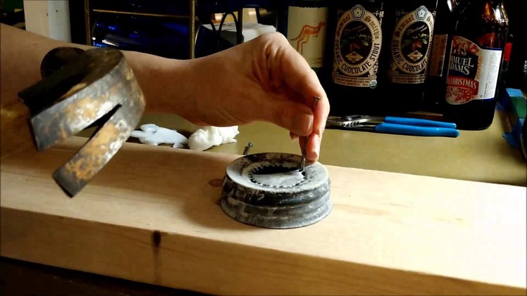 How to make a hole in a mason jar lid that has glass inside