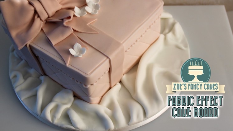 How to create a fabric effect on a cake board