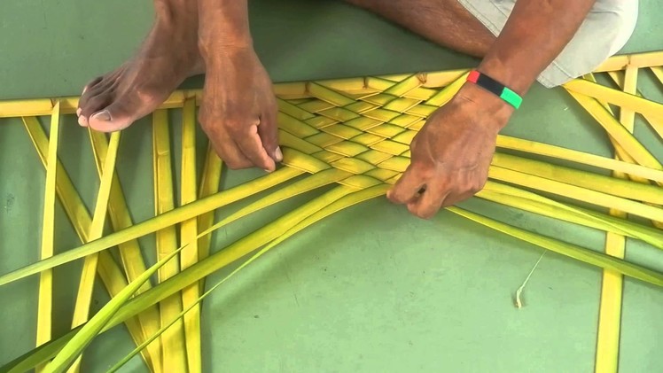 Weaving palm fronds