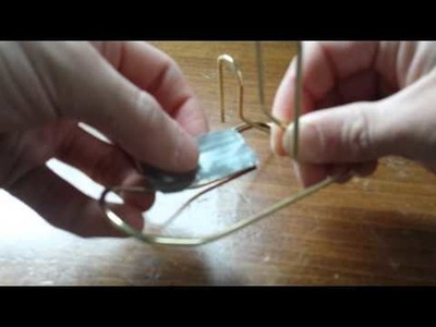 How to make a paperclip phone stand.