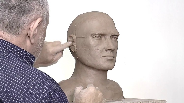 Alexander Cherkov demonstrates male head sculpture of clay - step by step