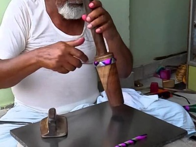 Traditional resin bangle maker in Churu, Rajasthan