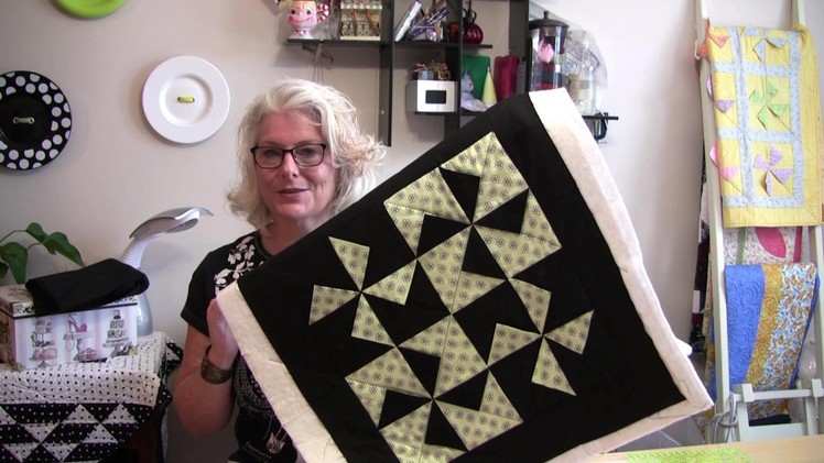 A two hour quick and easy dimensional pinwheel table top quilt