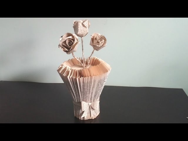 Don't trow away  your old books ! Use them for making a beautiful vase