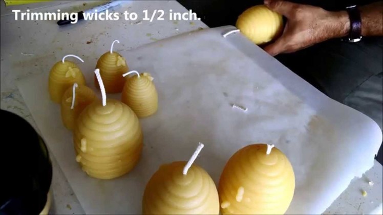 Making beeswax candles with homegrown beeswax