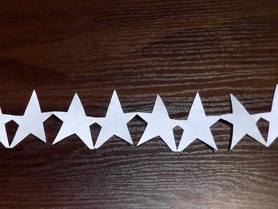 How to make a Star garlands of paper with their hands