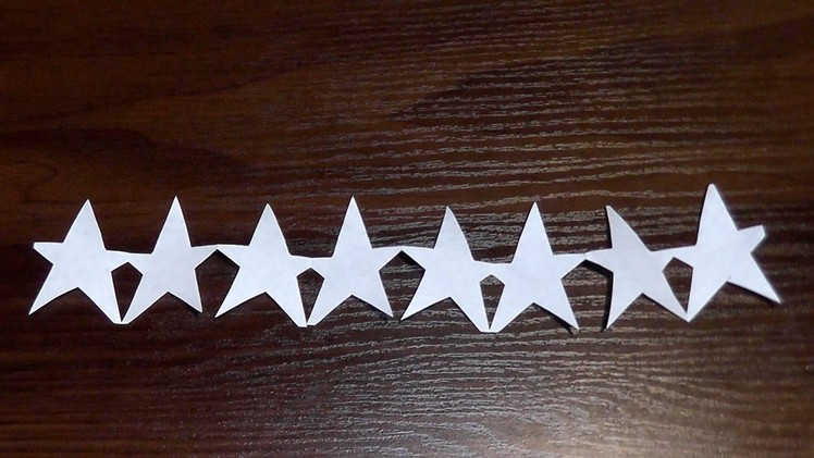 How to make a Star garlands of paper with their hands