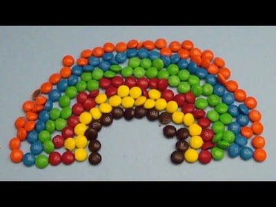 New Learn Colours with Surprise Eggs and a M & M Rainbow!