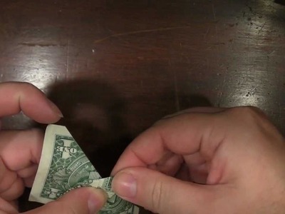 Origami Moth with a US dollar bill