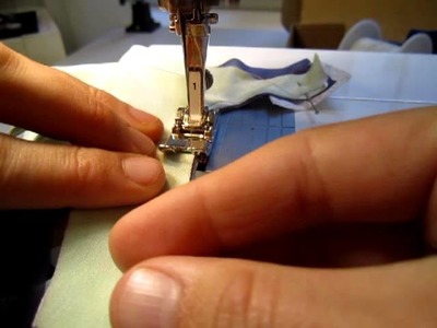 Sewing the Fingertips of Glove (Close-up)
