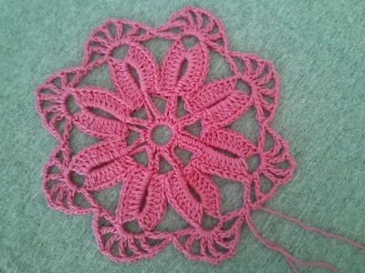 Crocheted flower motif no  13