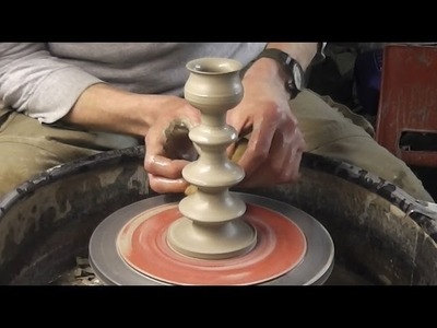 Making. throwing a Pottery Candlestick on the wheel