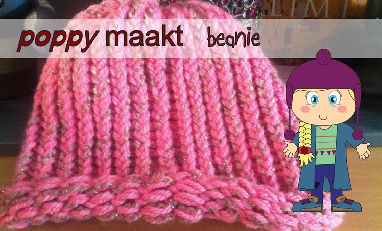 Poppy makes.  a beanie on a round knitting loom. Poppy maakt.  een beanie op een ronde brei loom