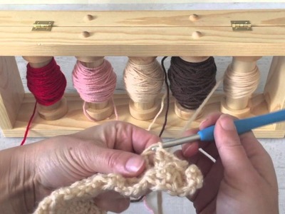 How to use a yarn bobbin holder