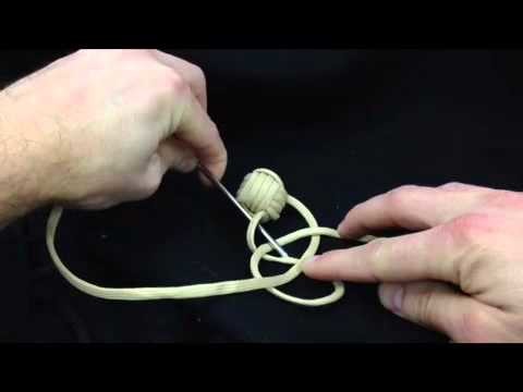 Paracordist how to tie a monkeys fist knot in hand - Part II of the quick release keychain bola