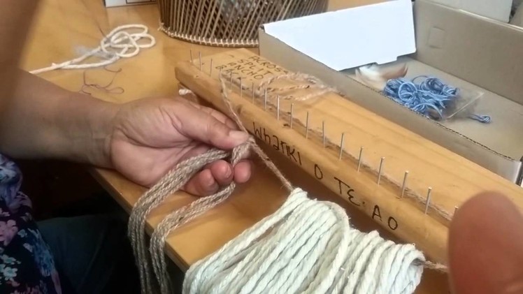 The weaving of korowai.