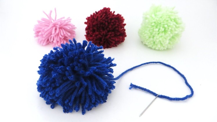 How to make a yarn pom pom with just yarn and scissors
