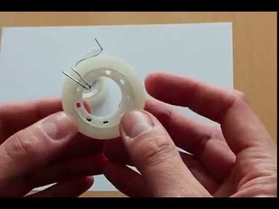 How to make a tape dispenser. cutter from a paper clip