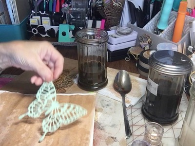 Paper die cuts as stencils for coffee dying